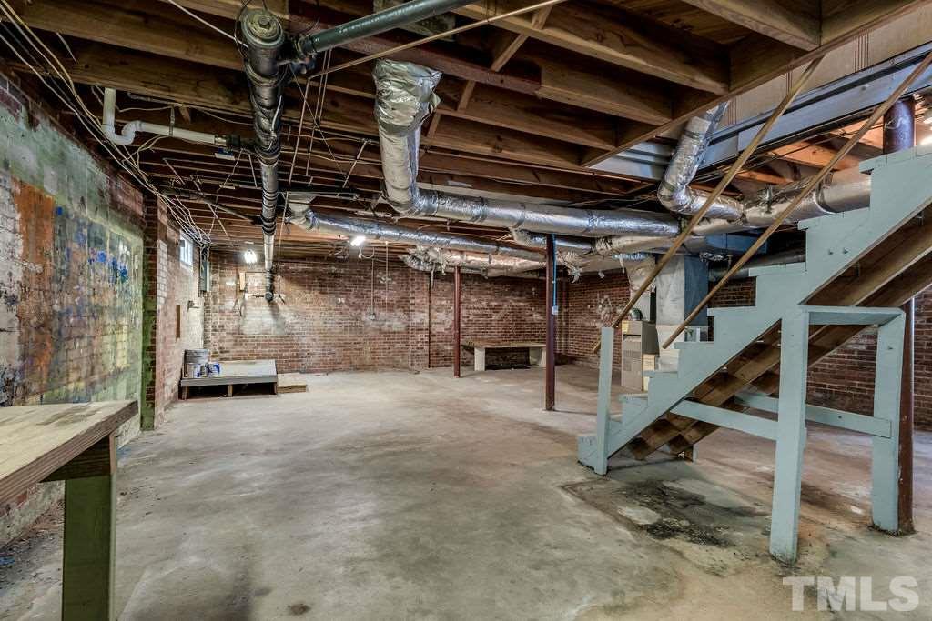 510 Harding Street Raleigh, NC 27604 - Photo 22 of 30 a view of an empty room with wooden floor
