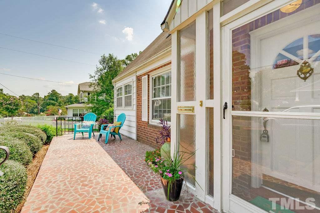 510 Harding Street Raleigh, NC 27604 - Photo 25 of 30 a view of a chairs with a table in the balcony