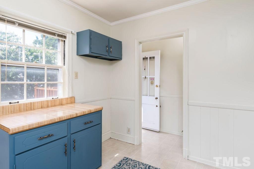 510 Harding Street Raleigh, NC 27604 - Photo 10 of 30 a room with a sink and a cabinet