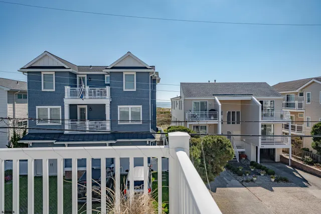 a front view of a house with glass windows