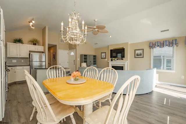 a view of a dining room with furniture