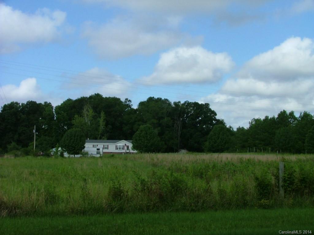 514 Billy Howey Road Waxhaw, NC 28173 - Photo 3 of 8 a view of a golf course with green space