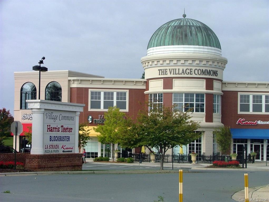 514 Billy Howey Road Waxhaw, NC 28173 - Photo 5 of 8 a front view of multi story residential apartment building with a yard