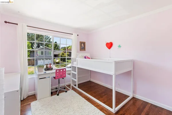 a room with furniture and a window