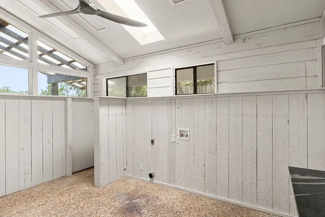 a view of a kitchen with furniture and a kitchen