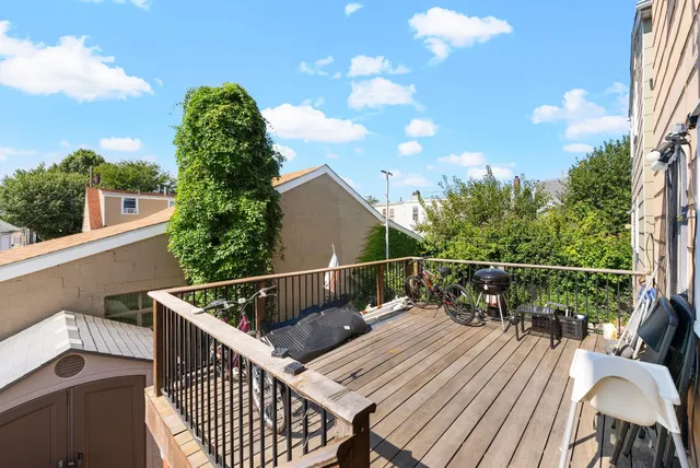 a view of balcony with furniture