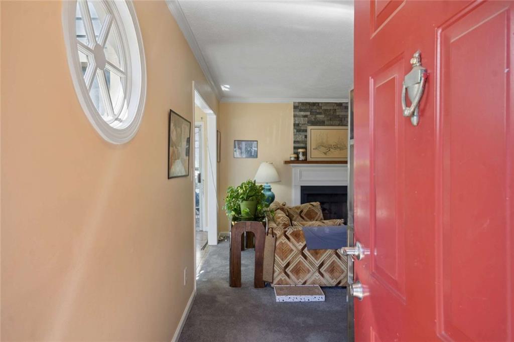 1382 Brockett Place Clarkston, GA 30021 - Photo 2 of 17 a view of a entryway with wooden floor