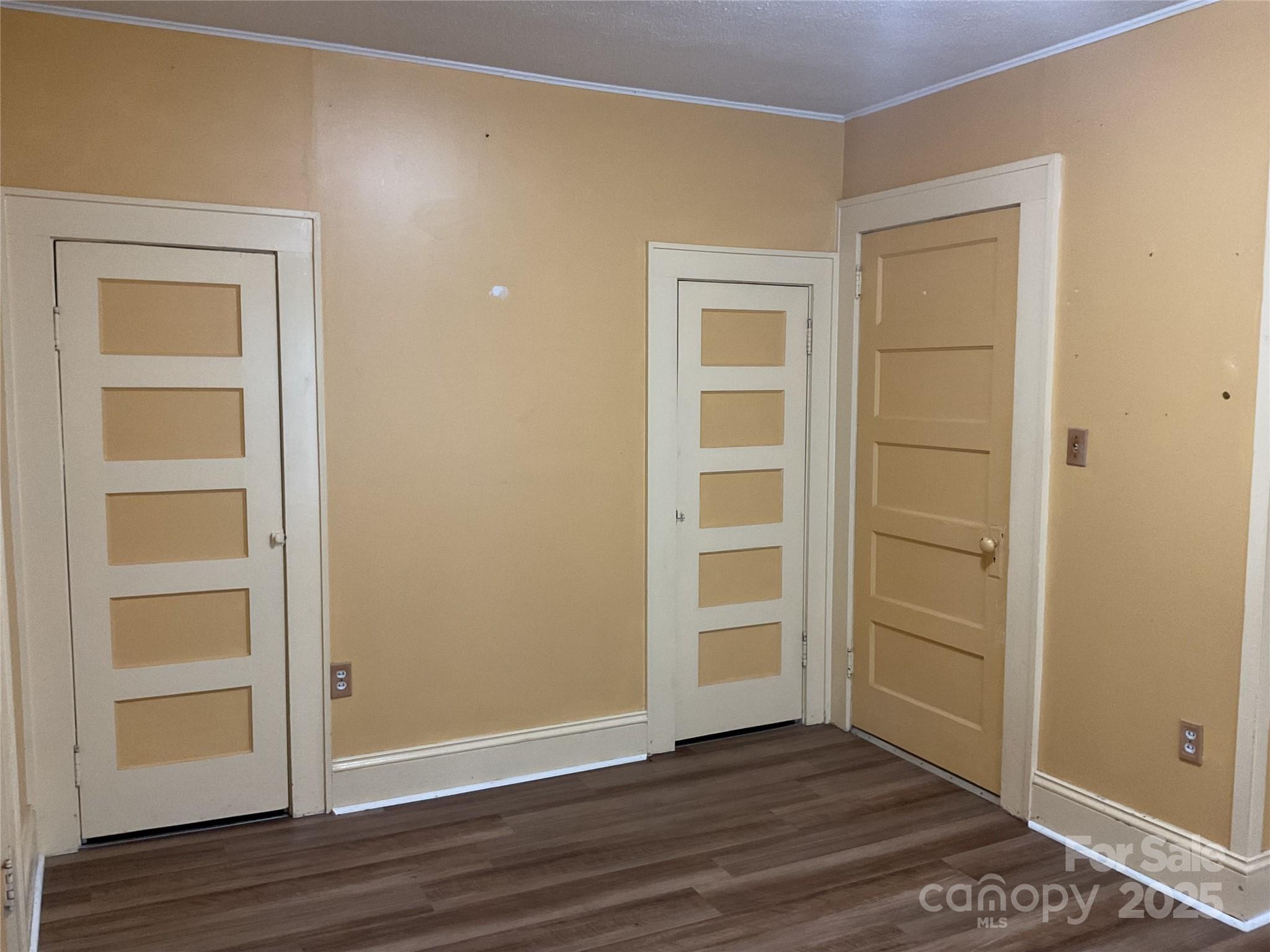 402 Connelly Springs Road Lenoir, NC 28645 - Photo 21 of 33 a view of an empty room with wooden floor & closet