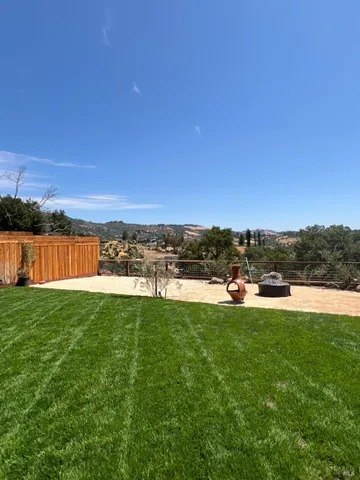 a view of a garden with houses