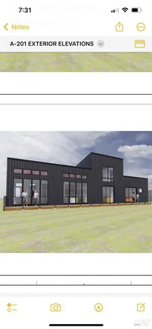 a view of a living room and an entryway