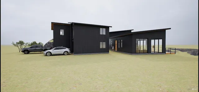a living room with furniture gym equipment and a ceiling fan