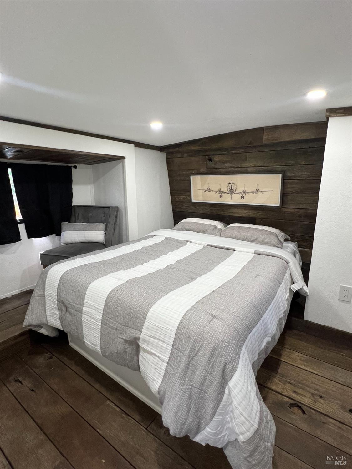 1436 Mark West Springs Road Santa Rosa, CA 95404 - Photo 37 of 39 a bedroom with a bed and a mirror