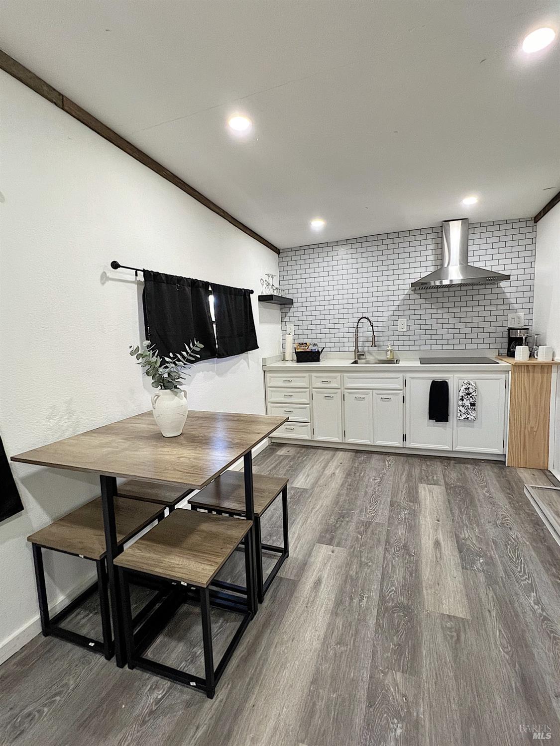 1436 Mark West Springs Road Santa Rosa, CA 95404 - Photo 38 of 39 a living room with furniture and a flat screen tv