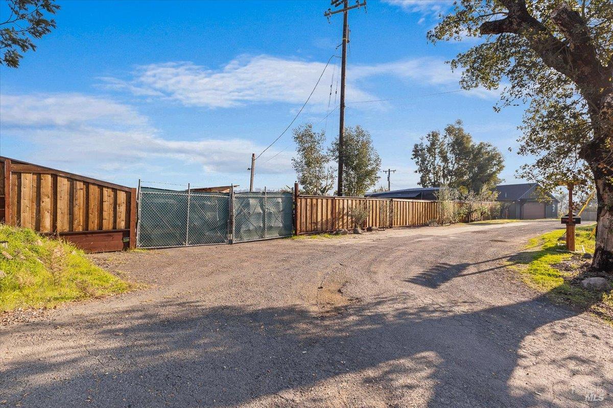1436 Mark West Springs Road Santa Rosa, CA 95404 - Photo 5 of 39 a view of a backyard with a tree