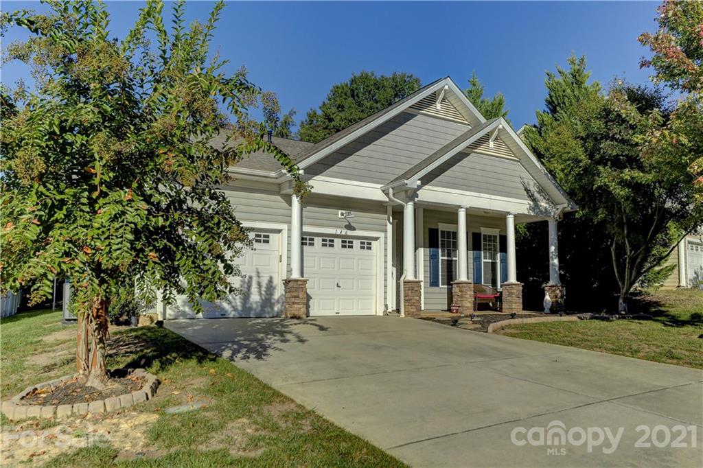 146 Whitley Mills Road Fort Mill, SC 29708 - Photo 1 of 37 a view of a house with backyard porch and sitting area
