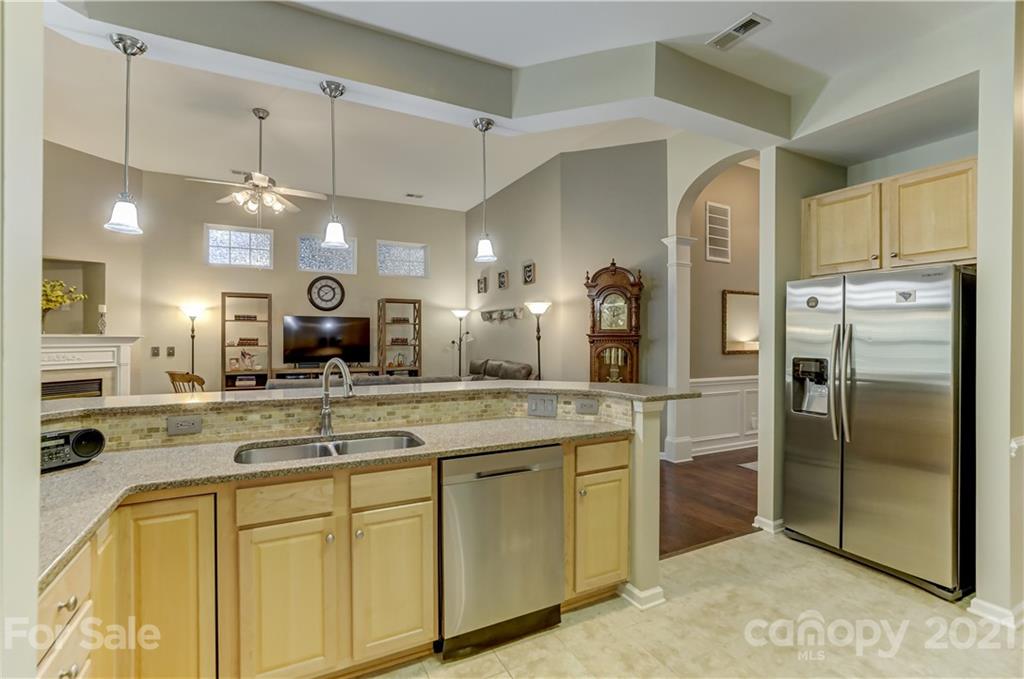 146 Whitley Mills Road Fort Mill, SC 29708 - Photo 14 of 37 a kitchen with cabinets a sink and appliances