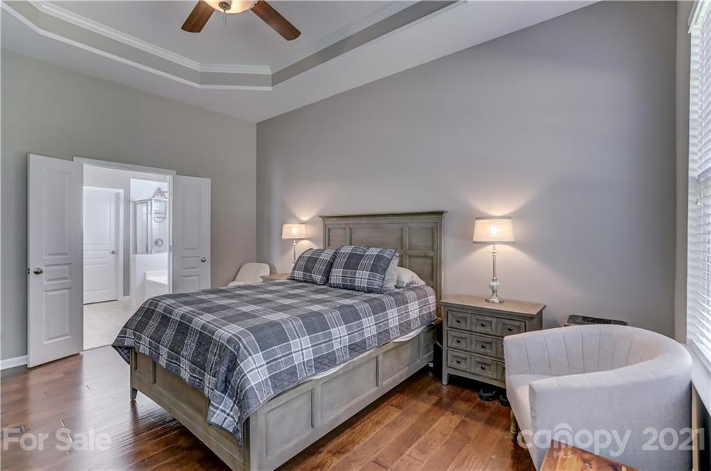 146 Whitley Mills Road Fort Mill, SC 29708 - Photo 20 of 37 a bedroom with a bed and a couch