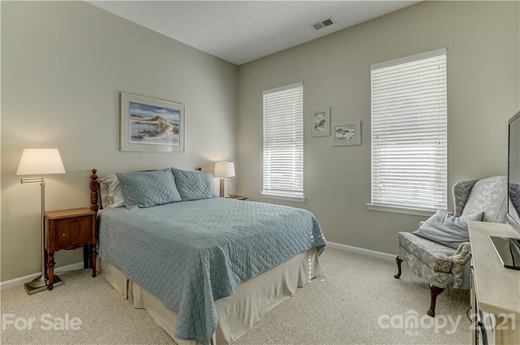 146 Whitley Mills Road Fort Mill, SC 29708 - Photo 24 of 37 a bedroom with a bed and a window