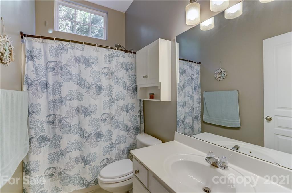 146 Whitley Mills Road Fort Mill, SC 29708 - Photo 26 of 37 a bathroom with a sink a toilet and shower