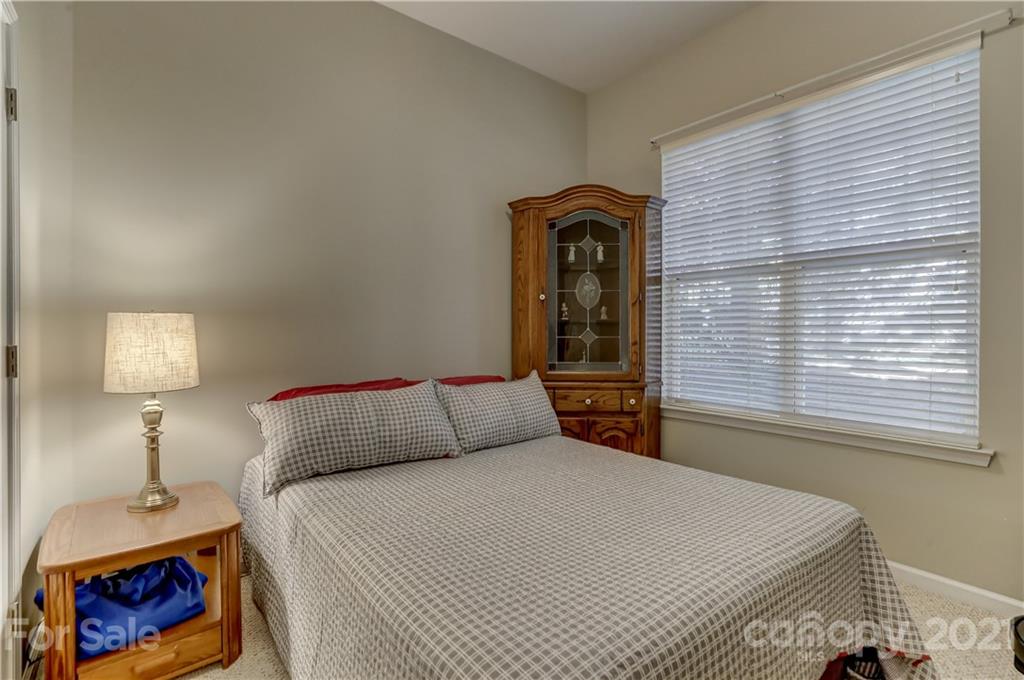 146 Whitley Mills Road Fort Mill, SC 29708 - Photo 27 of 37 a bedroom with a bed and a window