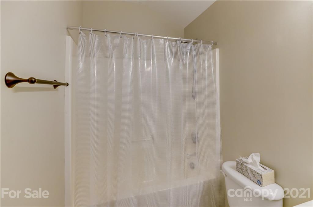 146 Whitley Mills Road Fort Mill, SC 29708 - Photo 32 of 37 a bathroom with a shower and a tub