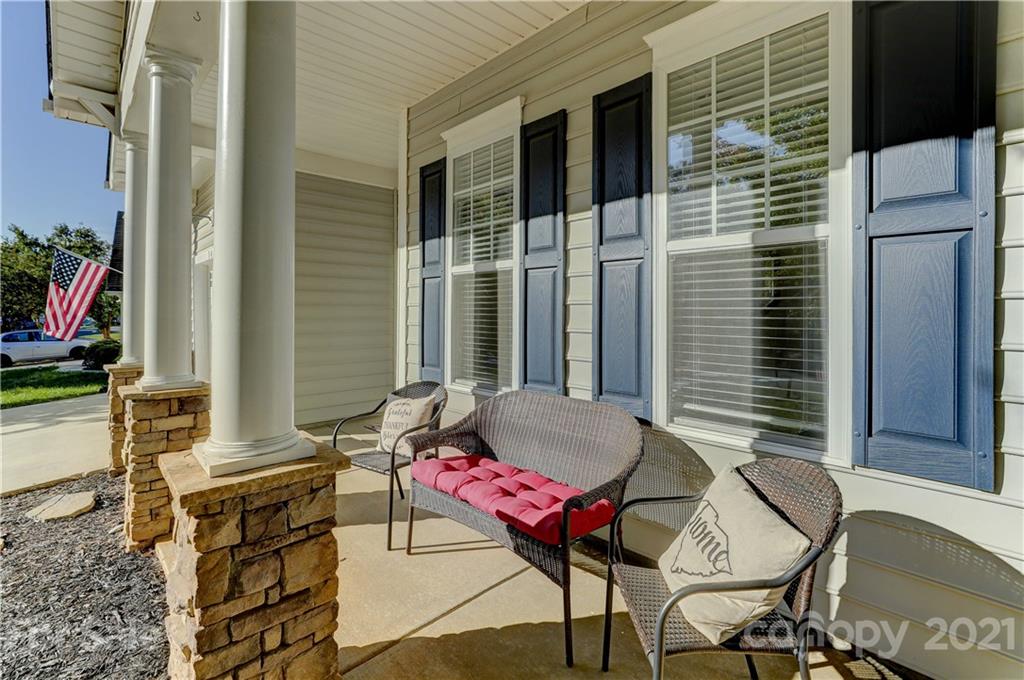 146 Whitley Mills Road Fort Mill, SC 29708 - Photo 5 of 37 a backyard of a house with outdoor seating
