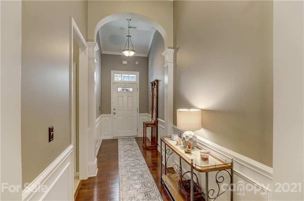 146 Whitley Mills Road Fort Mill, SC 29708 - Photo 6 of 37 a view of a hallway with wooden floor
