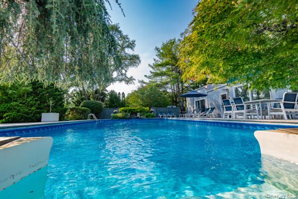 3 Mallard Lane Remsenburg, NY 11960 - Photo 38 of 40 a view of a house with pool