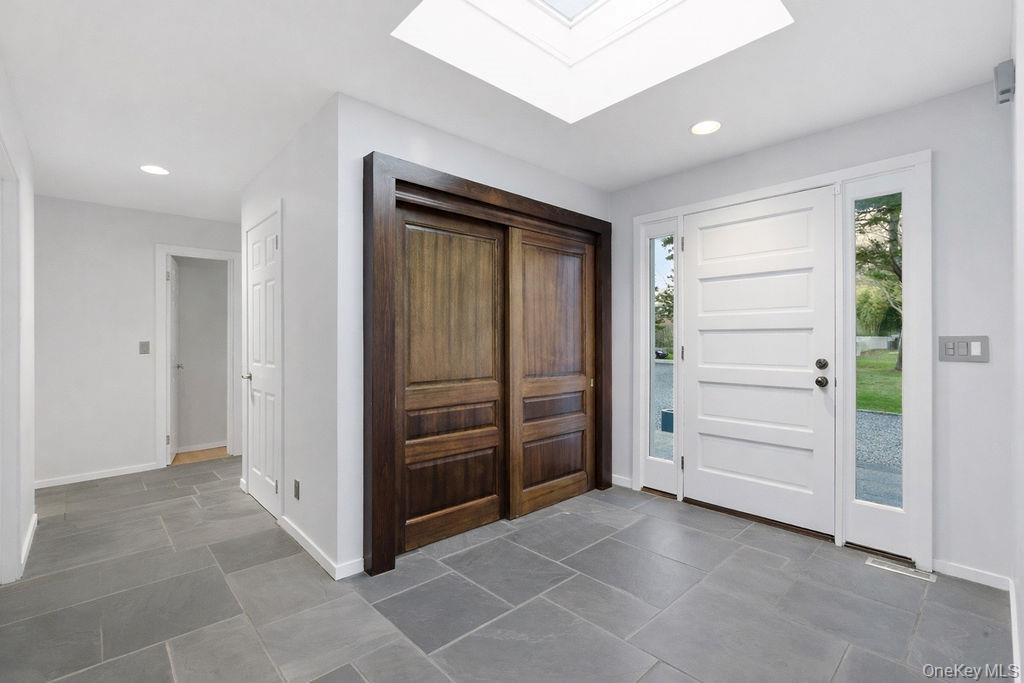3 Mallard Lane Remsenburg, NY 11960 - Photo 6 of 40 a view of a hallway with closet