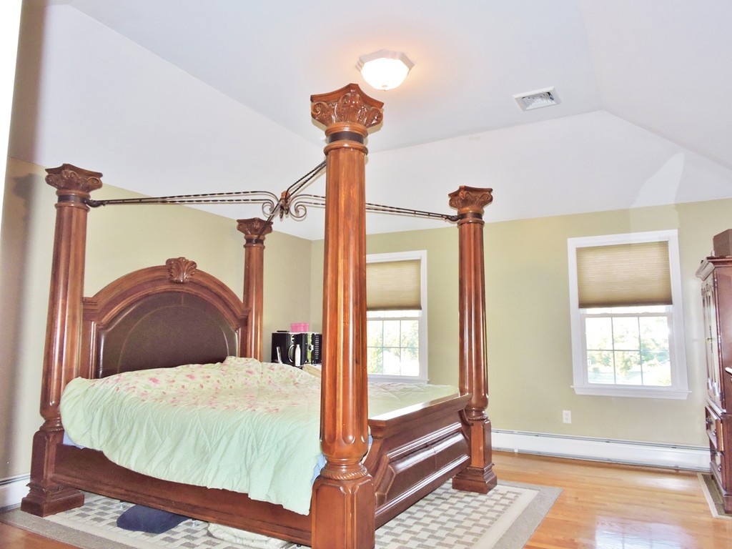 3 Cromwell Lane Rochester, MA 02770 - Photo 11 of 15 a bedroom with a bed and a window