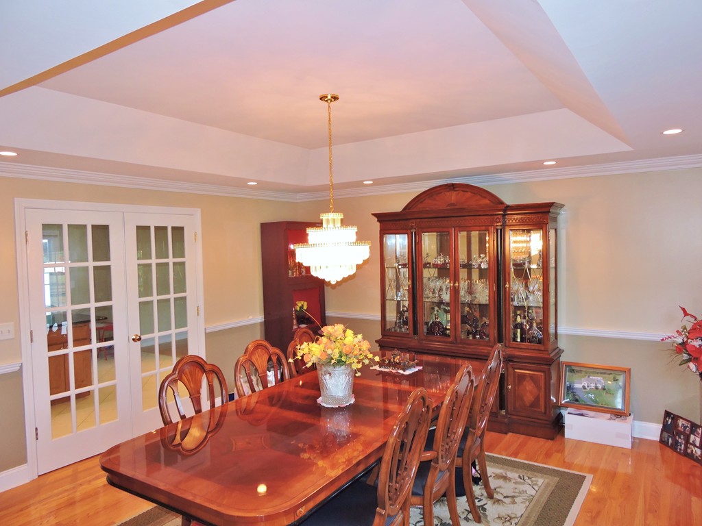 3 Cromwell Lane Rochester, MA 02770 - Photo 3 of 15 a view of a dining room with furniture window and wooden floor
