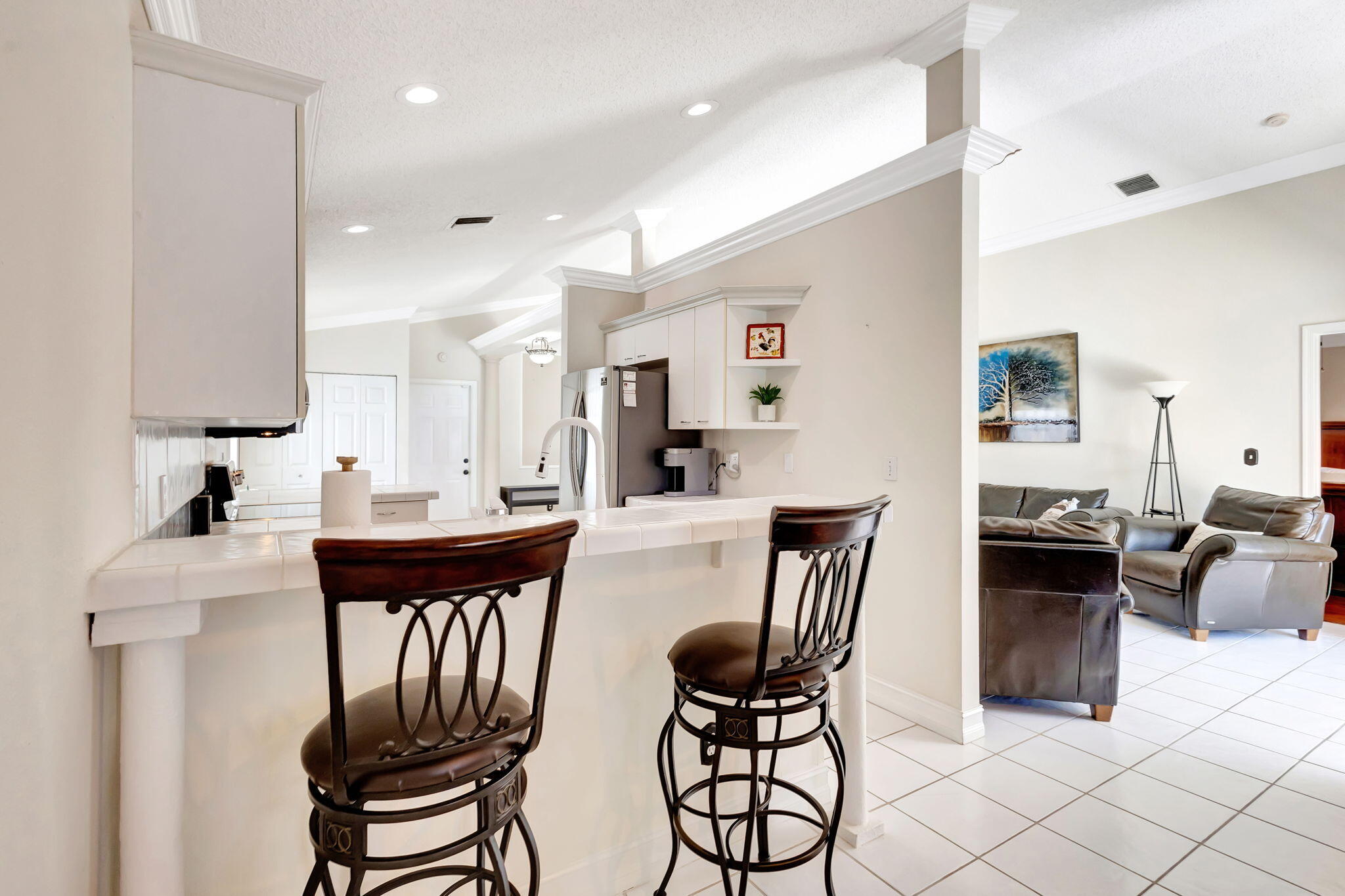 1833 Barnstable Road Wellington, FL 33414 - Photo 8 of 66 Bar Stool counter off kitchen