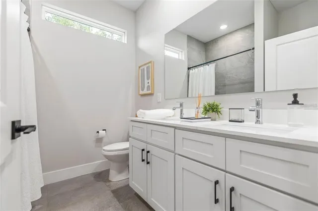 a bathroom with a white bath tub