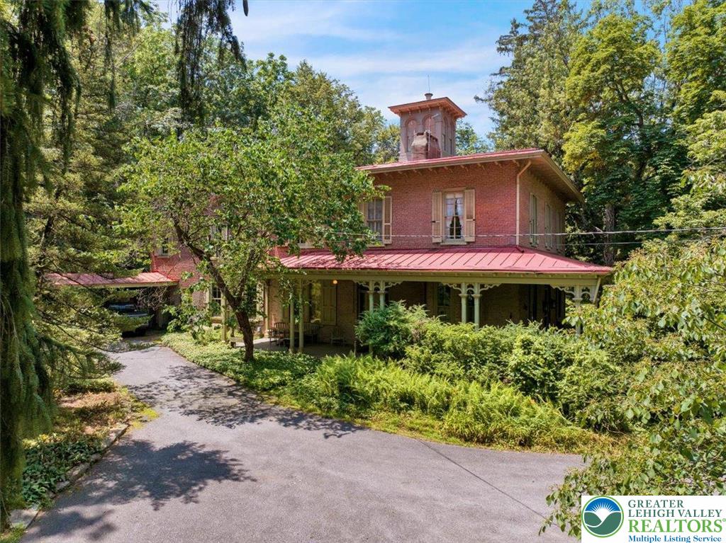 1670 Moselem Spring Road Hamburg, PA 19526 - Photo 14 of 50 a front view of a house with a yard