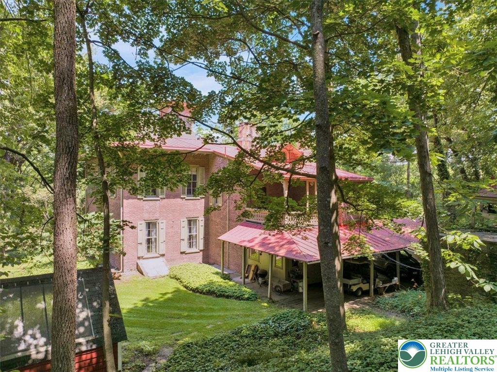 1670 Moselem Spring Road Hamburg, PA 19526 - Photo 17 of 50 a view of a house with a yard and sitting area