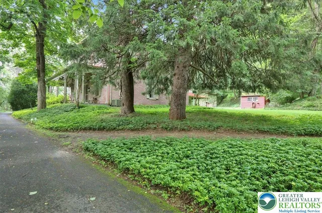 front view of a house with a small yard