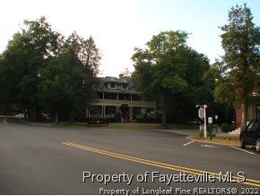 105 Magnolia Road Pinehurst, NC 28374 - Photo 6 of 25 a view of a street with parked cars
