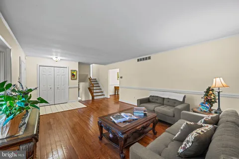 a house that has tree in front of it