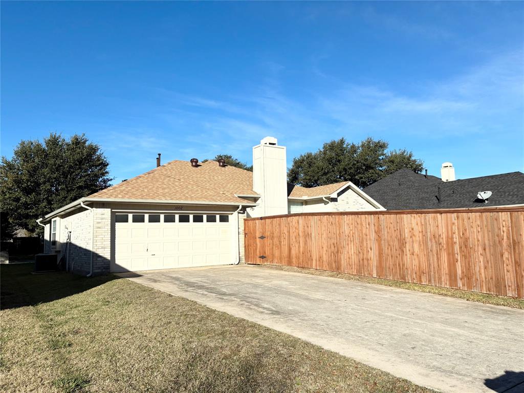1002 Morningside Lane Allen, TX 75002 - Photo 16 of 18 a house with a yard