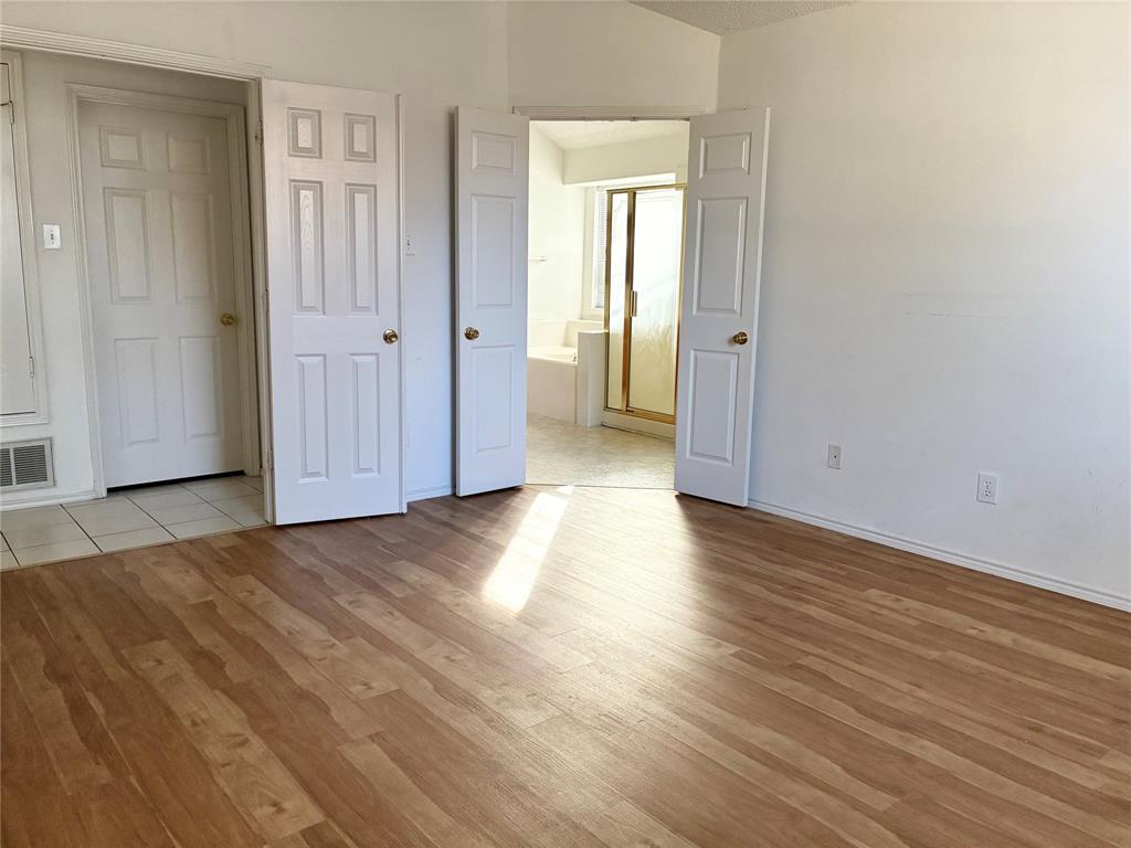 1002 Morningside Lane Allen, TX 75002 - Photo 8 of 18 a view of a livingroom with wooden floor