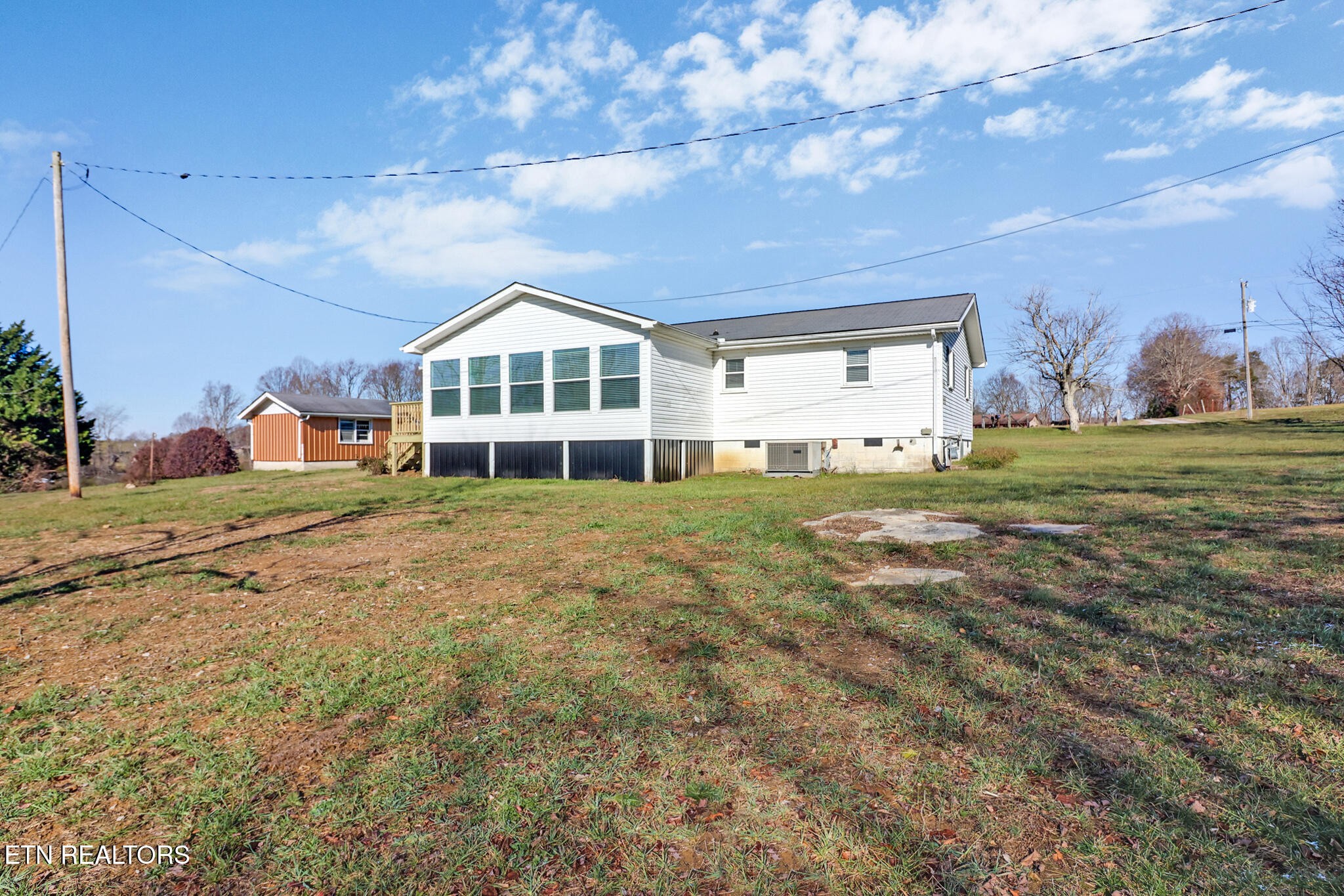 1065 Old Grimsley Road Grimsley, TN 38565 - Photo 4 of 43 a view of a house with a big yard and large trees