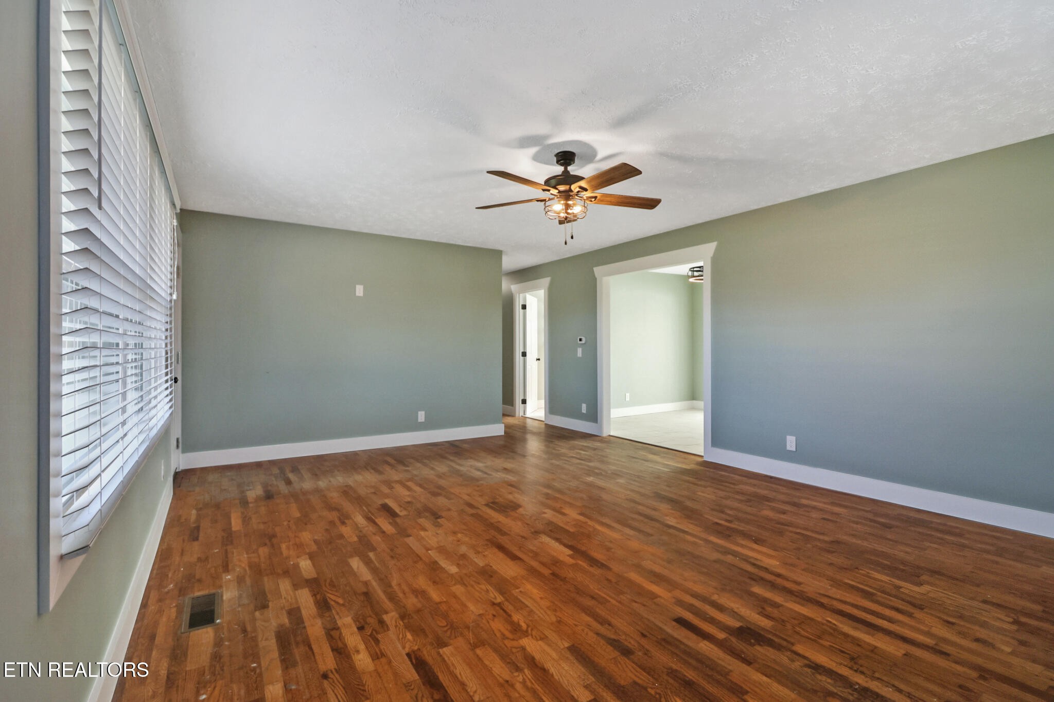 1065 Old Grimsley Road Grimsley, TN 38565 - Photo 10 of 43 wooden floor in an empty room with a window