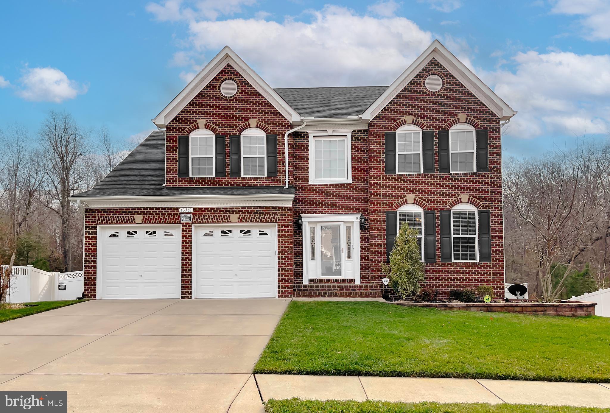43361 Quail Street Hollywood, MD 20636 - Photo 2 of 73 a front view of a house with a yard