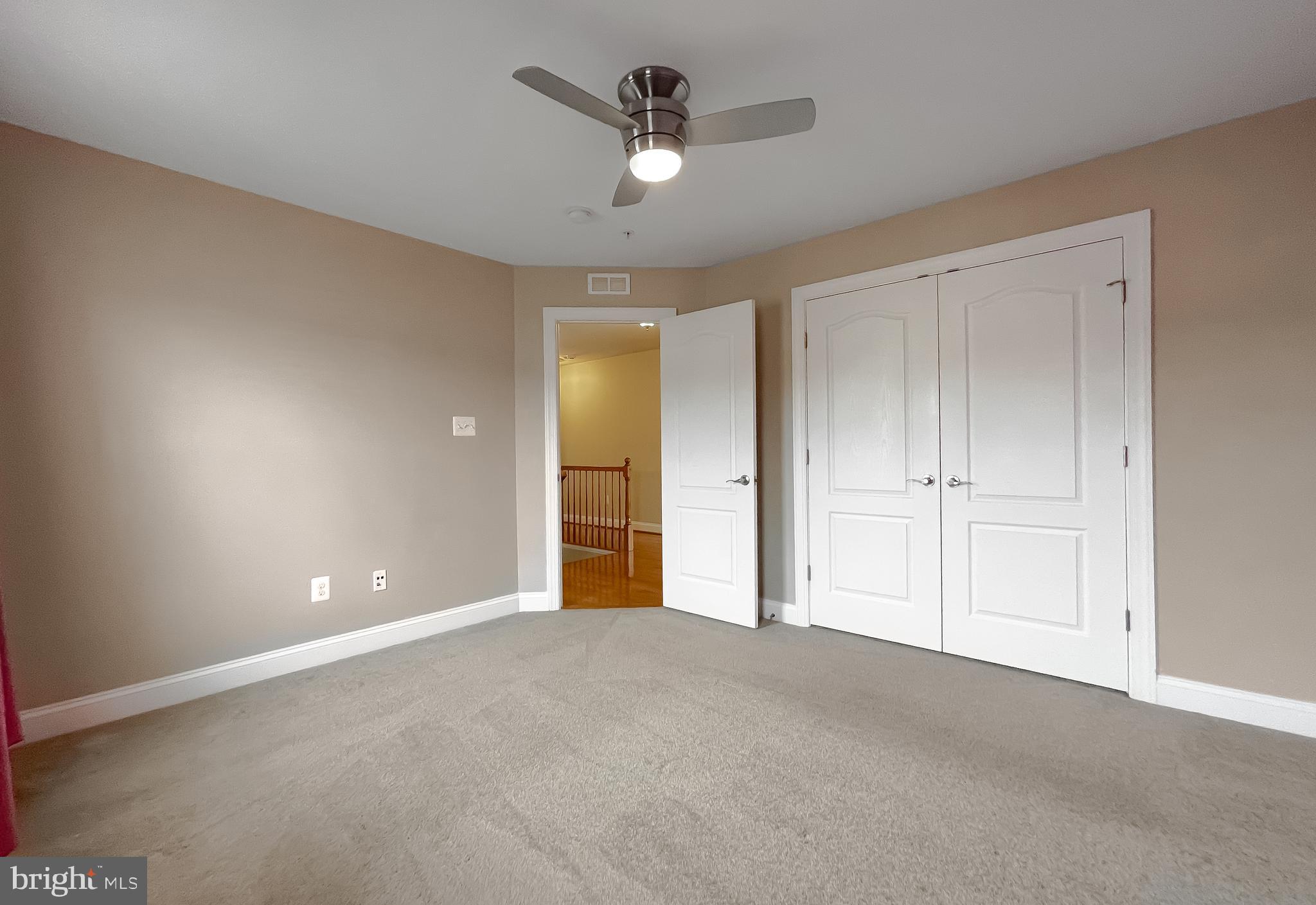 43361 Quail Street Hollywood, MD 20636 - Photo 26 of 73 a view of an empty room and a ceiling fan window