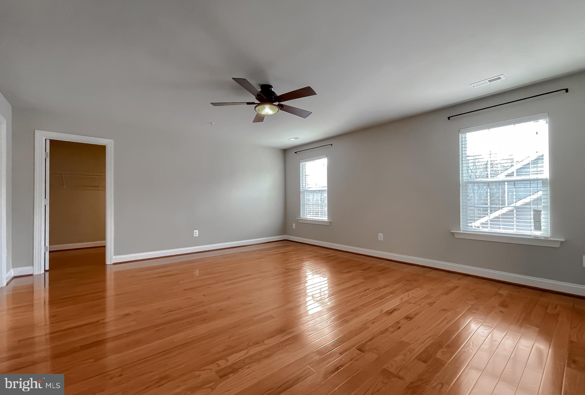 43361 Quail Street Hollywood, MD 20636 - Photo 38 of 73 a view of empty room with wooden floor and fan