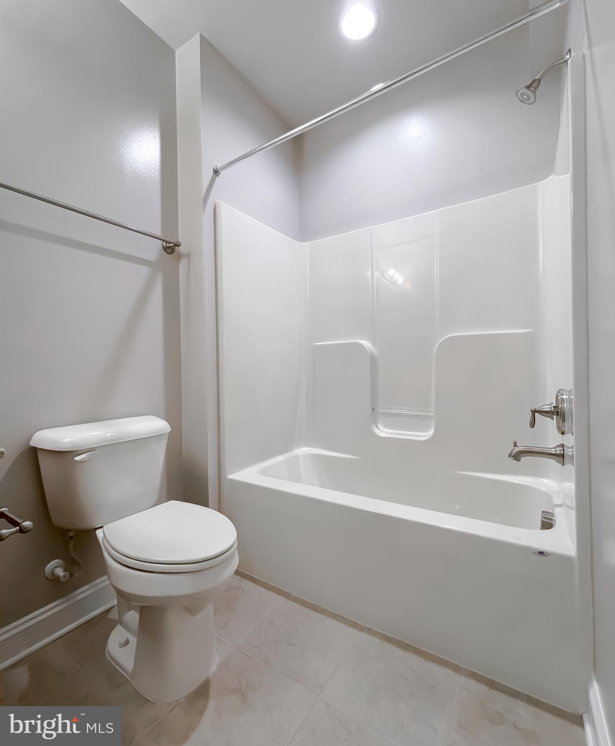 43361 Quail Street Hollywood, MD 20636 - Photo 52 of 73 a white toilet sitting next to a bath tub