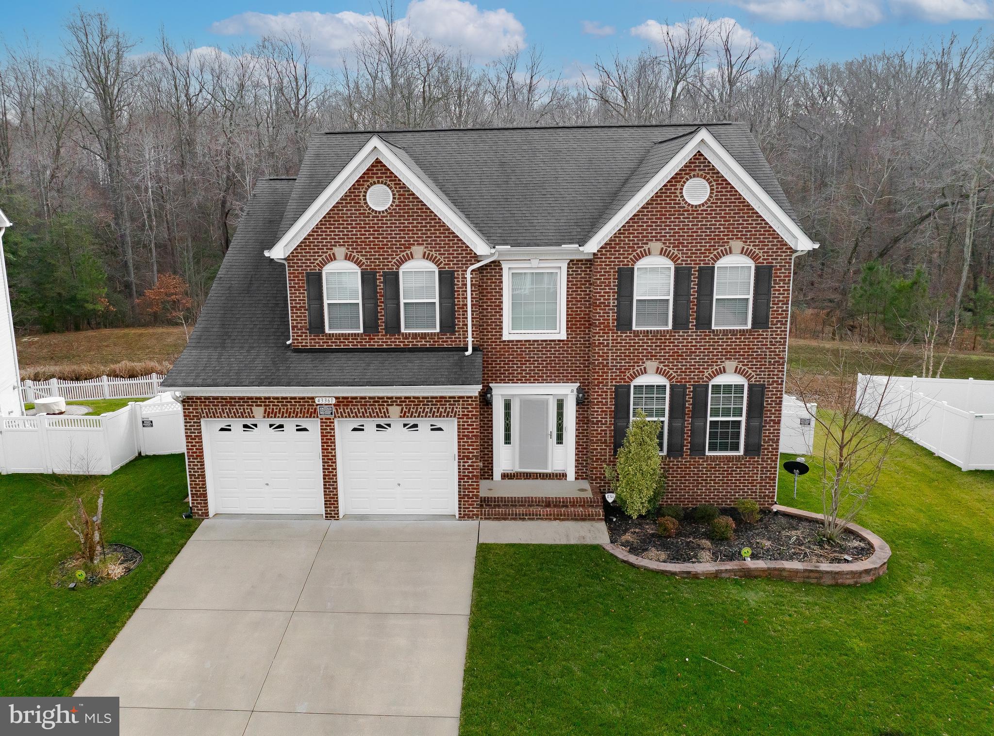 43361 Quail Street Hollywood, MD 20636 - Photo 68 of 73 a front view of a house with a yard