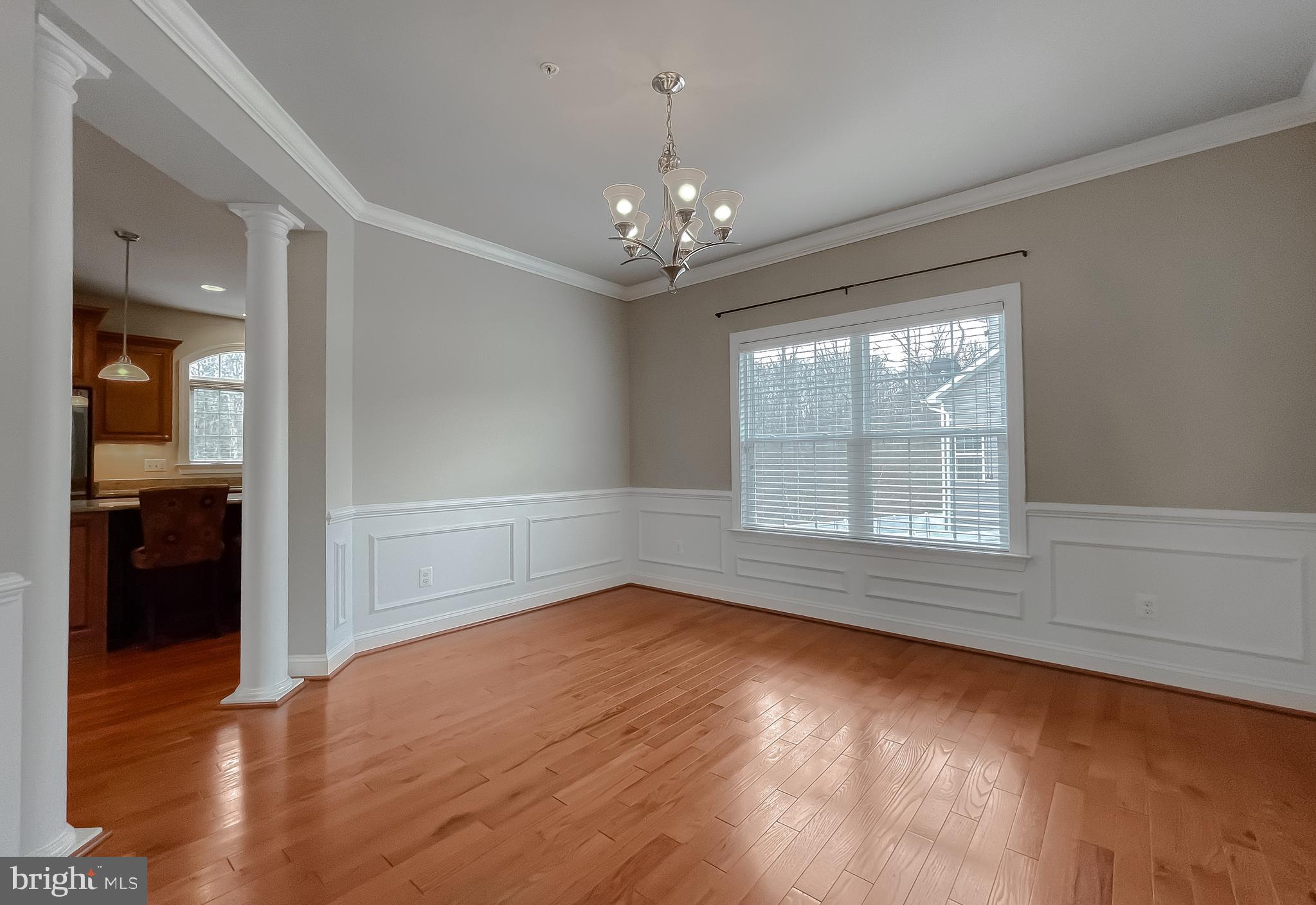 43361 Quail Street Hollywood, MD 20636 - Photo 8 of 73 wooden floor in an empty room with a window