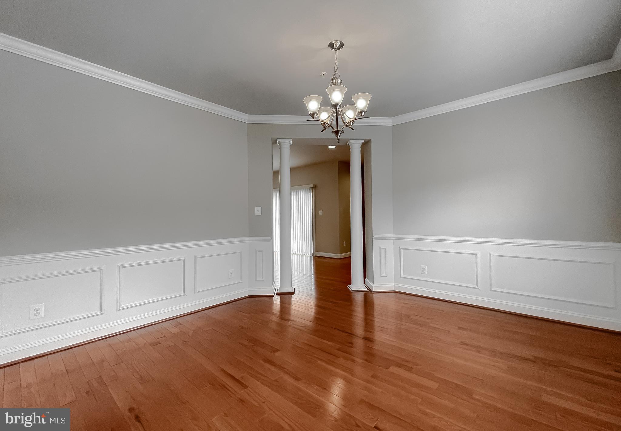43361 Quail Street Hollywood, MD 20636 - Photo 9 of 73 a view of an empty room with wooden floor