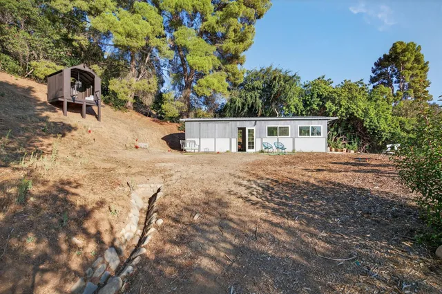 a view of a terrace with a garden